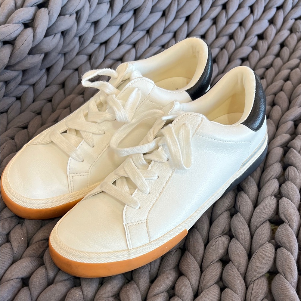 Chic White Sneakers with Black and Tan Accents